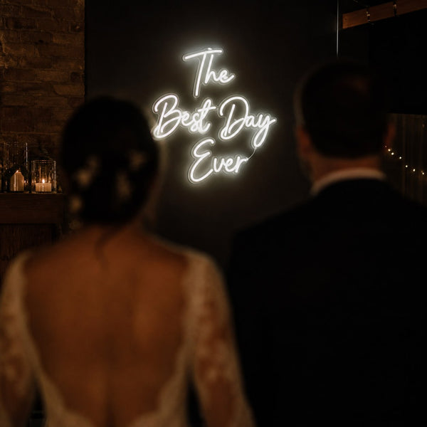 Real wedding with neon sign
